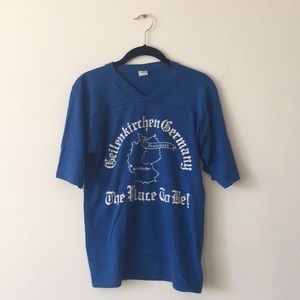 Vintage blue T-shirt with white lettering
